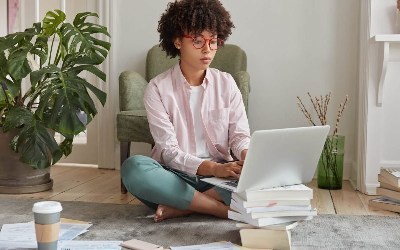 black-businesswoman-keyboards-on-laptop-computer-RXTPFFR-rbappm134i1gbmjrb5o3lsfcbdjxihic2uhv9m0g3s